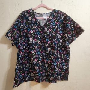 SB Scrubs short-sleeve scrub top with a colorful geometric pattern Size 3x